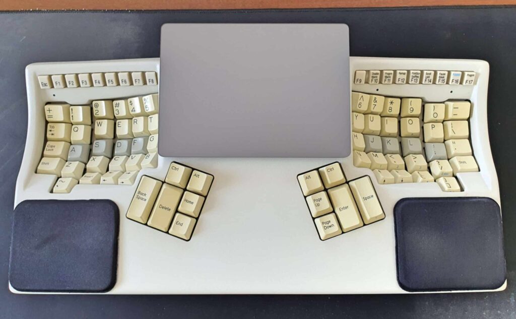 Top view of my Kinesis Model 100 contoured keyboard and Apple Magic Trackpad 2.
